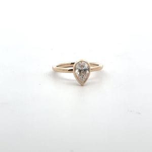 Lab Grown Bezel Set Pear Diamond Engagement Ring