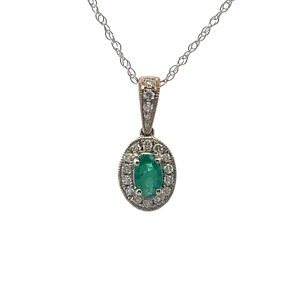 Oval-Cut Green Emerald Solitaire Pendant in Halo